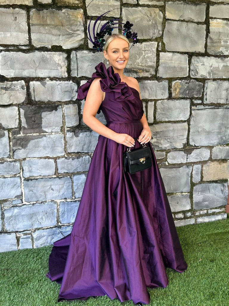 Aoife, a purple silk organza ball gown with a one shoulder neckline and a ruffle at the shoulder.
