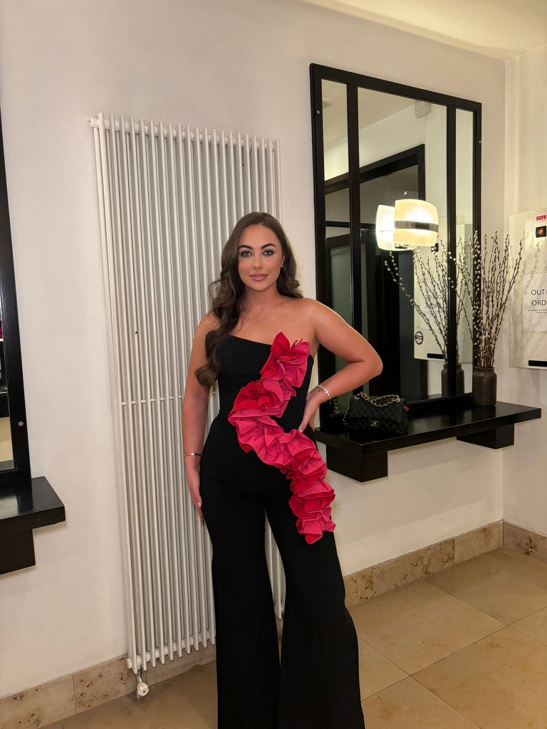 Brooke, black jumpsuit, third view.