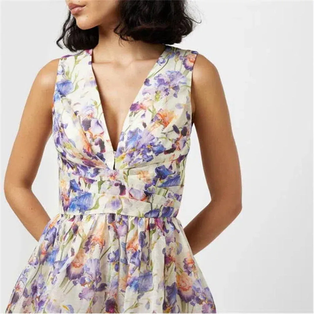 Adalyn, a cream mini with a watercolour iris print in blue, lilac and coral.