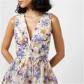 Adalyn, a cream mini with a watercolour iris print in blue, lilac and coral.