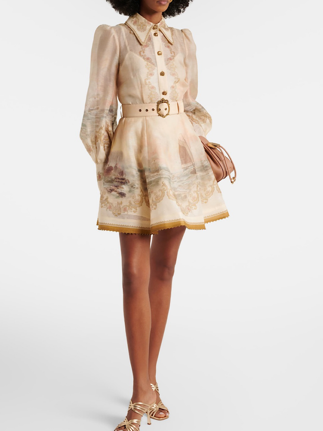 Delilah, a soft ivory mini with a vintage inspired print and a structured shirt style bodice with button detail.