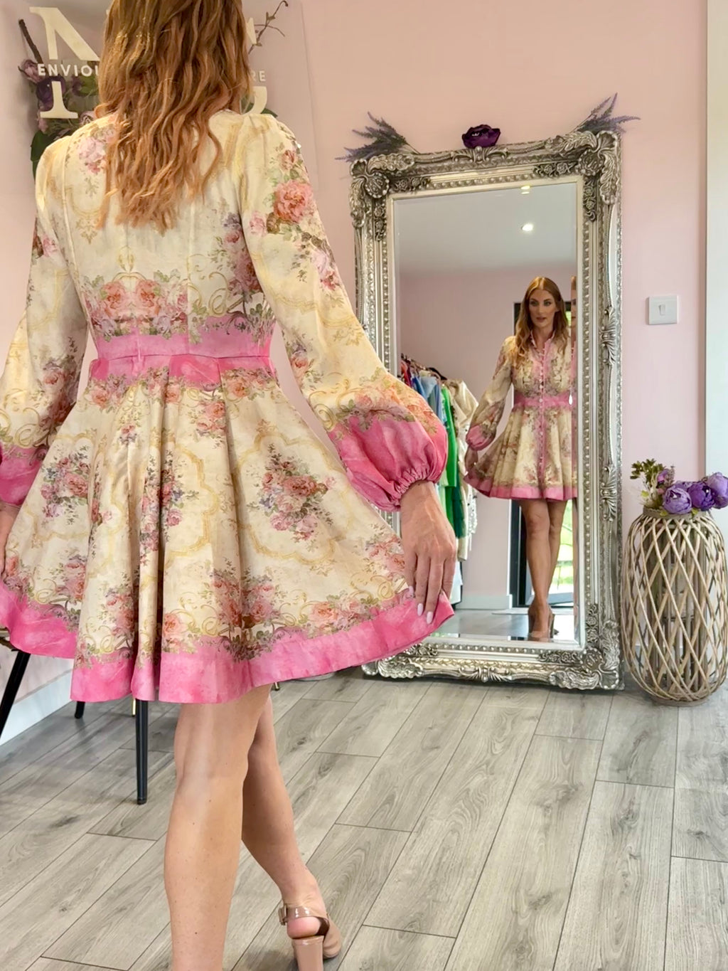 Addison, a fresh cream and pink mini with a button down front and an A line skirt.
