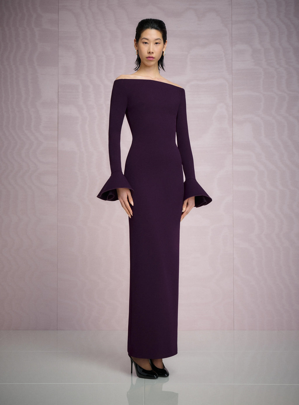 Mabel, a plum column maxi with a wide off the shoulder neckline and fluted cuffs.