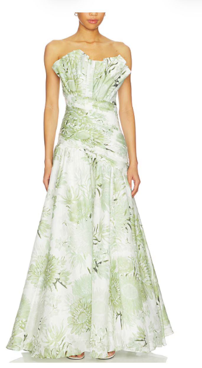 Stella, a floor length organza gown in a romantic large scale sage floral, with a fan pleated bodice.