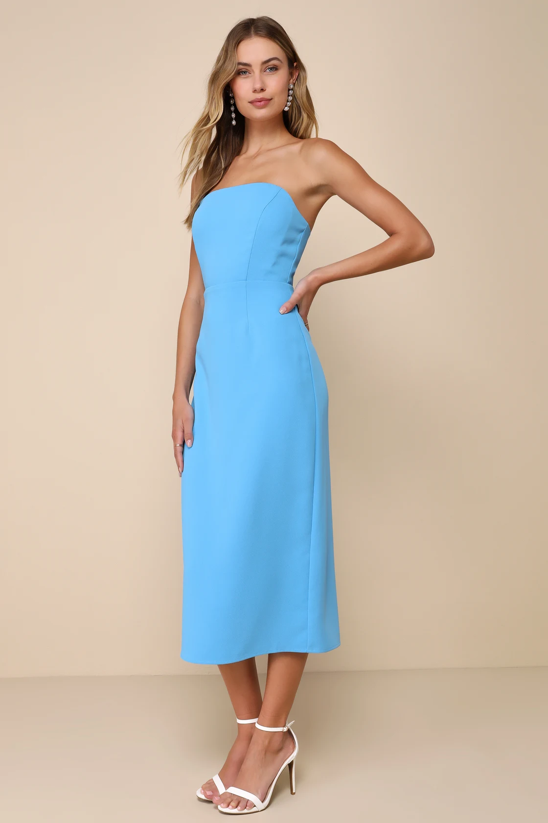 Skye, a blue midi with an elegant strapless corset bodice and a sleek fitted shape.